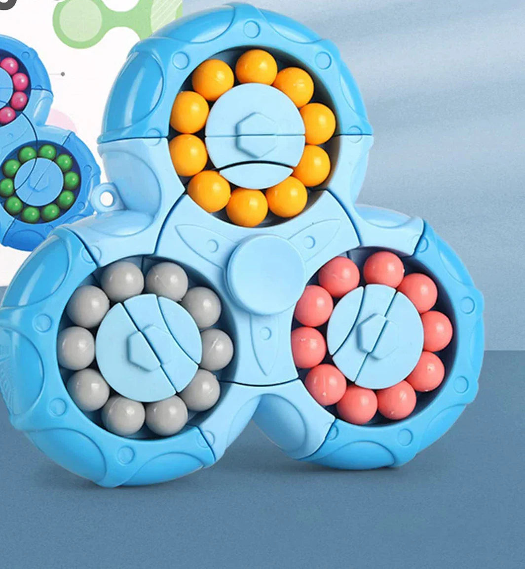 Blauer Fidget Spinner mit bunten Kugeln, Stressabbau Spielzeug, sensorische Stimulation.