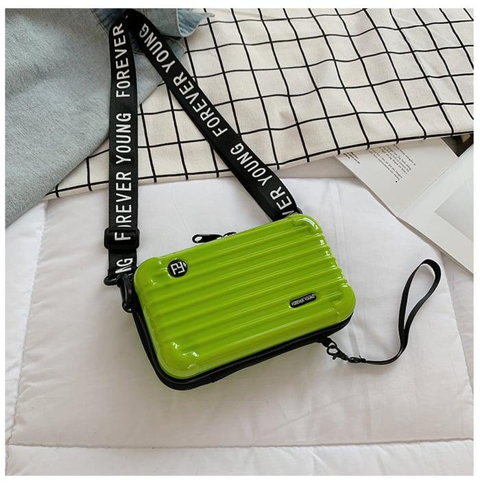 Grüne Mini-Koffer-Handtasche für Damen, Hartschale, mit Schriftzug "Forever Young".