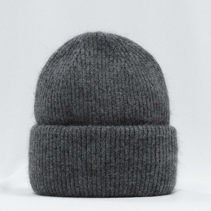 Dunkelgraue Strickmütze aus Wolle, warm und stilvoll, ideal für Wintermode.