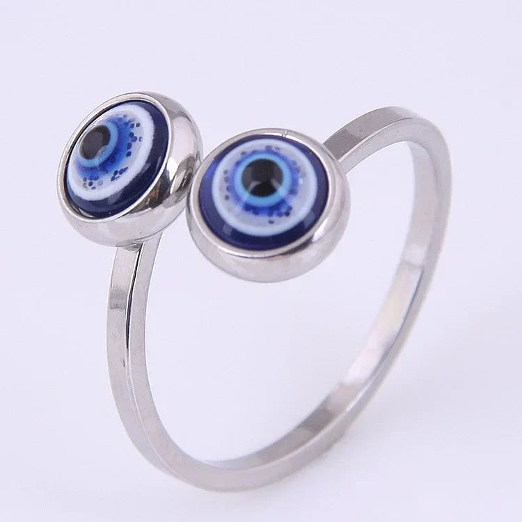 Silberring mit zwei blauen Augen, Edelstahl, modisches Schmuckstück, böser Blick Design.