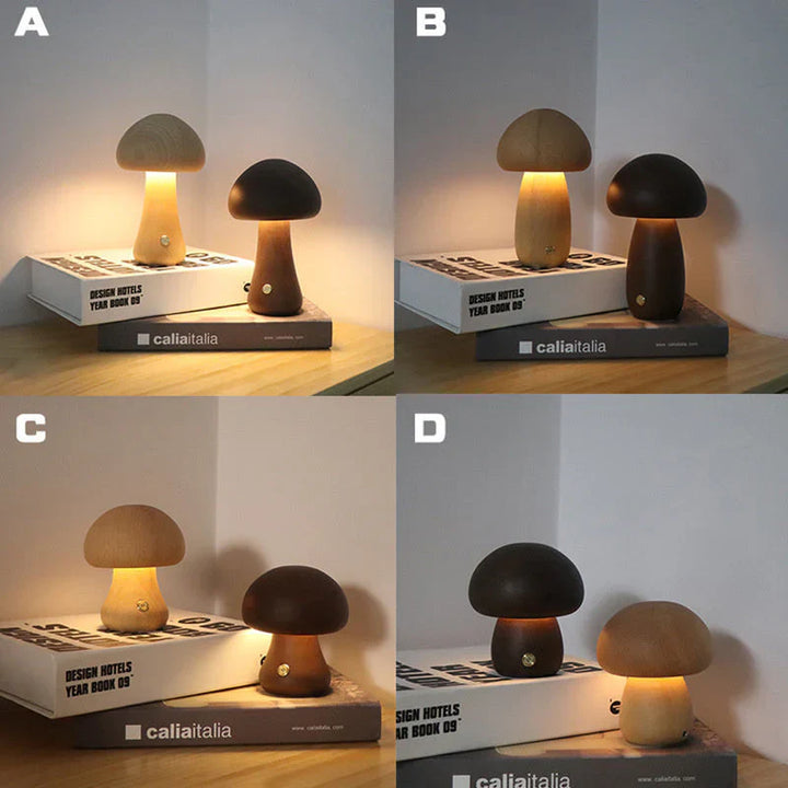 Vier Pilz-Tischlampen aus Holz, verschiedene Farben, auf einem Tisch mit Büchern, modernes Design.