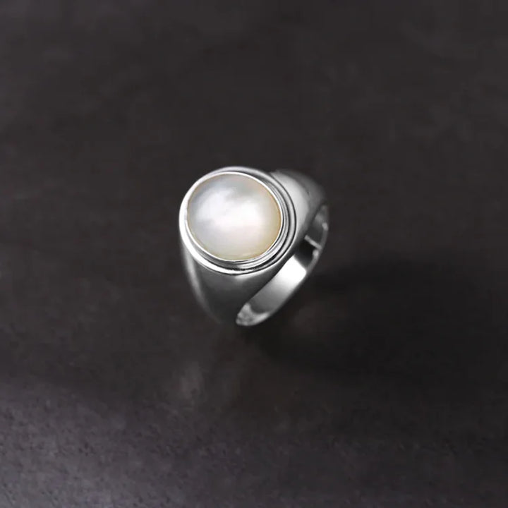 Silberring mit rundem Perlmuttstein, elegantes Design, Schmuck für Damen und Herren.