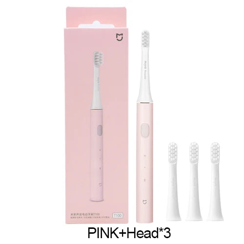 Elektrische Zahnbürste rosa, wiederaufladbar, mit drei Ersatzbürstenköpfen, Verpackung.