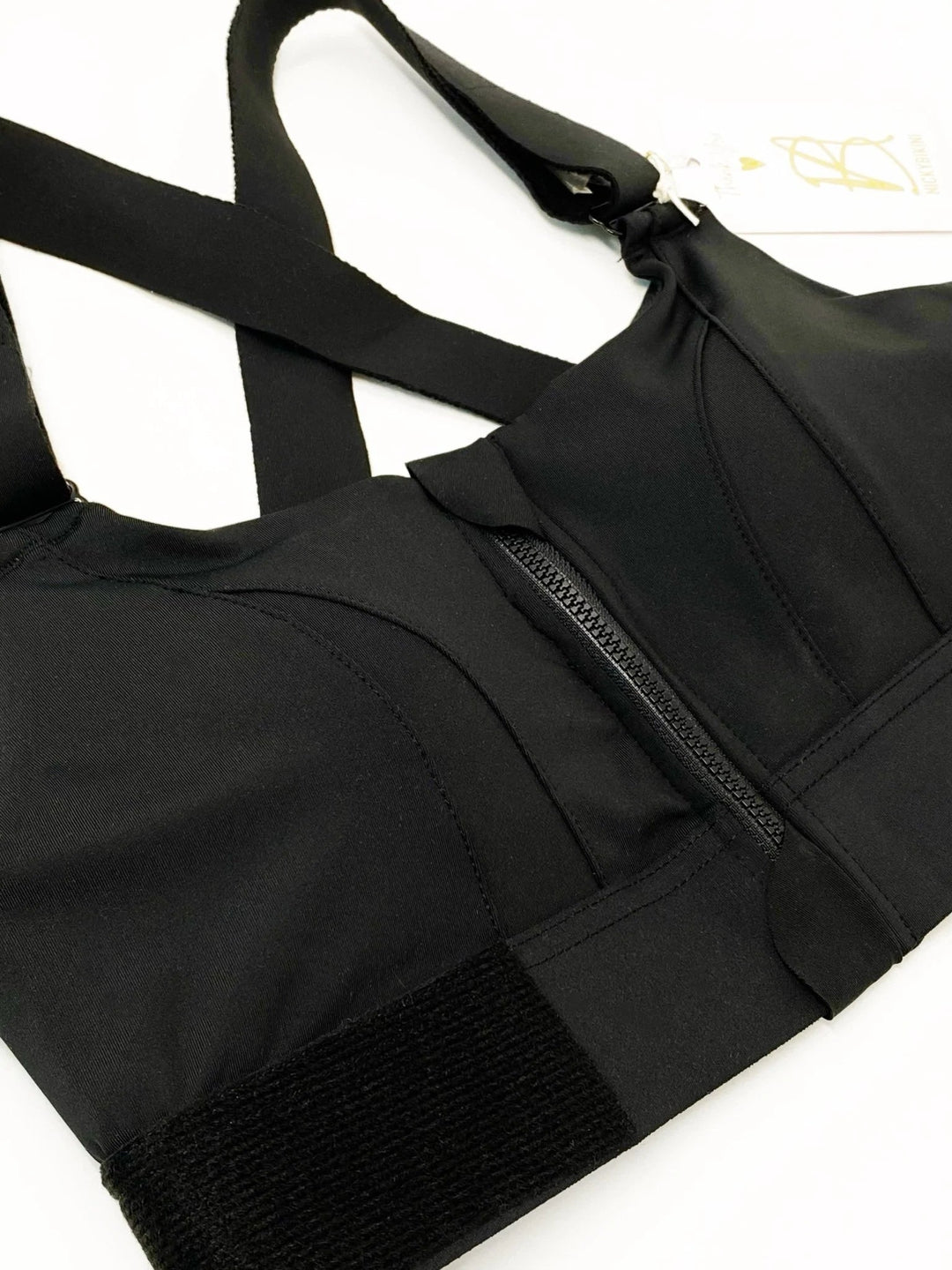 Schwarzer Sport-BH mit Reißverschluss, hoher Halt, Damen-Fitnessbekleidung, atmungsaktiv.