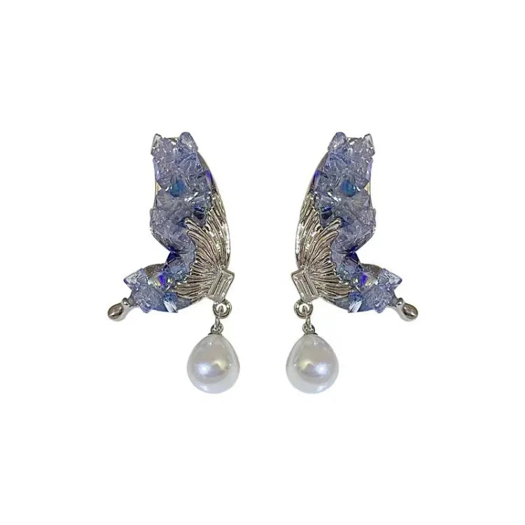 Silberne Ohrringe mit blauen Kristallen und Perlenanhänger, eleganter Schmuck für Damen.