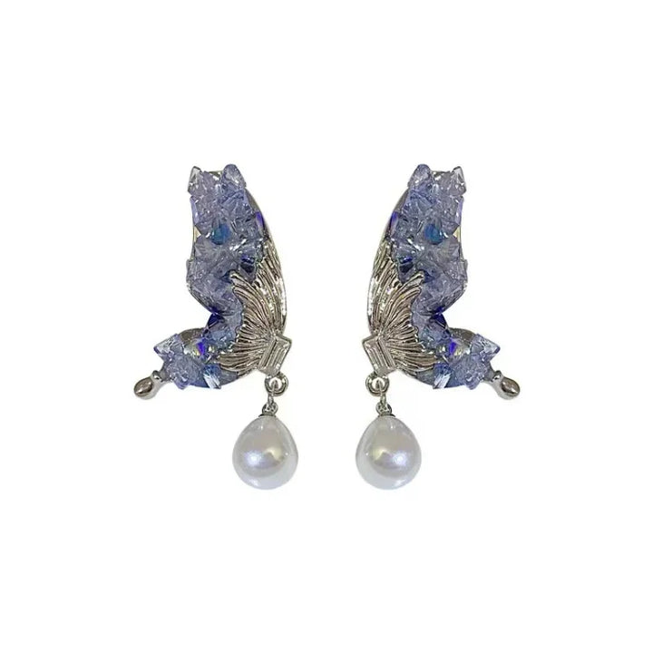 Silberne Ohrringe mit blauen Kristallen und Perlenanhänger, eleganter Schmuck für Damen.