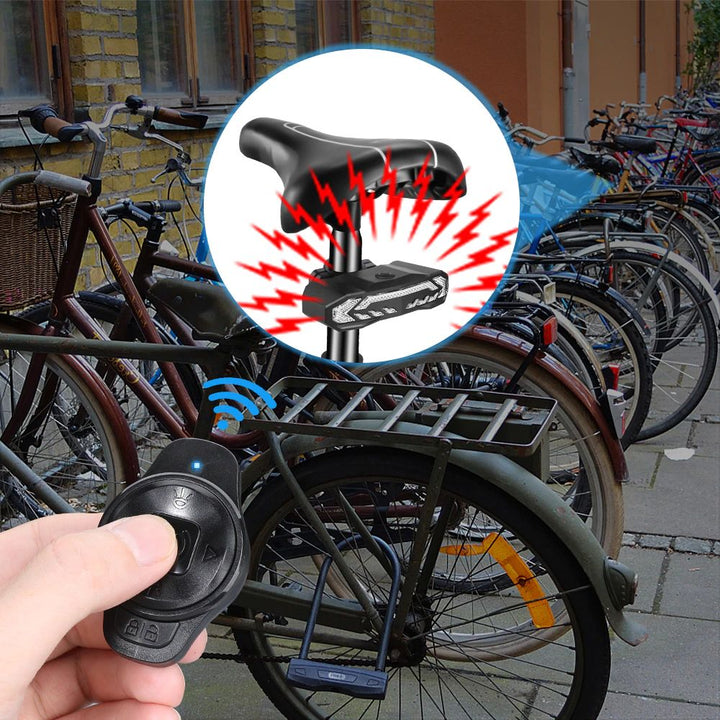 Fahrradalarm mit Fernbedienung, Diebstahlschutz, schwarz, auf Fahrrad montiert.