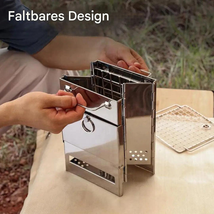 Faltbare Edelstahl-Holzkohlegrill für Camping, tragbar, kompakt, Outdoor-Kochen.