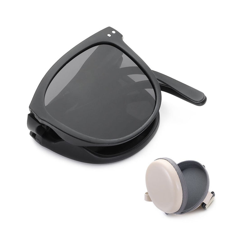 Schwarze faltbare Sonnenbrille mit Etui, UV-Schutz, modisch, kompakt, Reiseaccessoire.