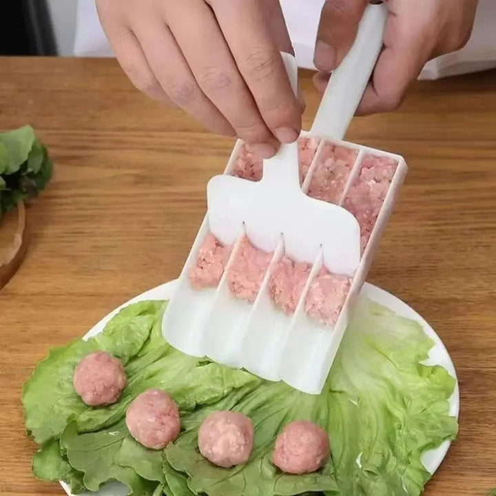 Handlicher Fleischbällchenformer aus Kunststoff, weiß, für gleichmäßige Portionierung von Hackfleisch.
