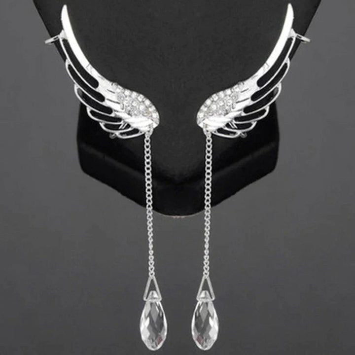 Silberne Engelsflügel-Ohrringe mit Kristallanhängern, eleganter Schmuck für Damen.