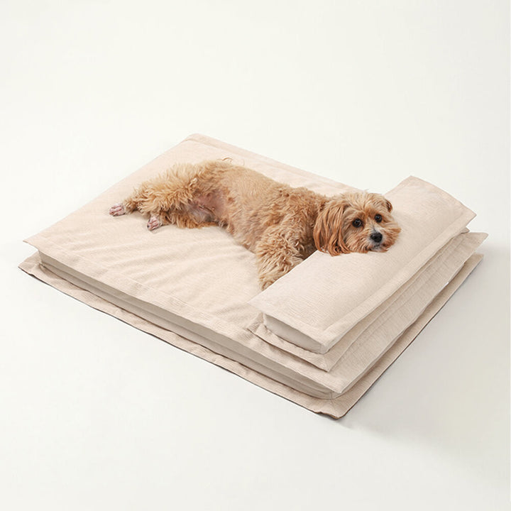 Beiges, wasserdichtes Hundebett mit Anti-Angst-Funktion und Schwammunterstützung.