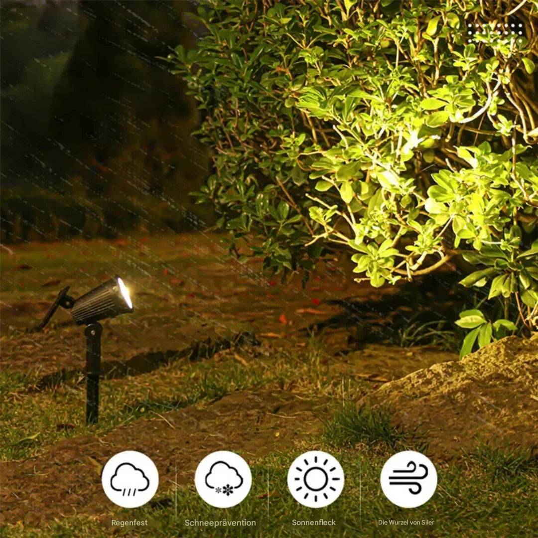 Wasserdichter LED-Gartenstrahler beleuchtet Busch, wetterfest, energiesparend, Außenbeleuchtung.