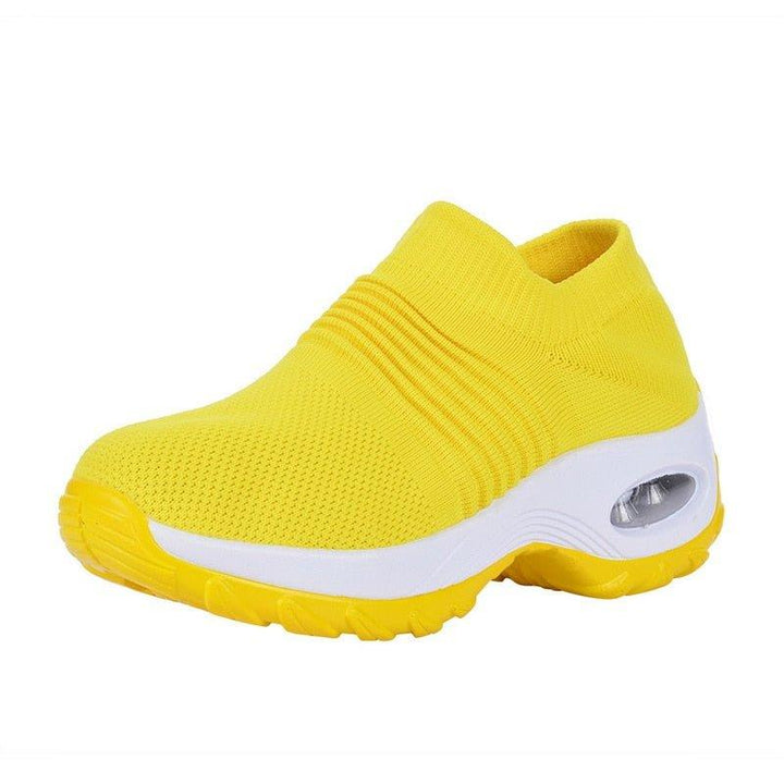 Gelbe Damen-Walkingschuhe, atmungsaktiv, bequem, mit weißer Sohle, sportlich.