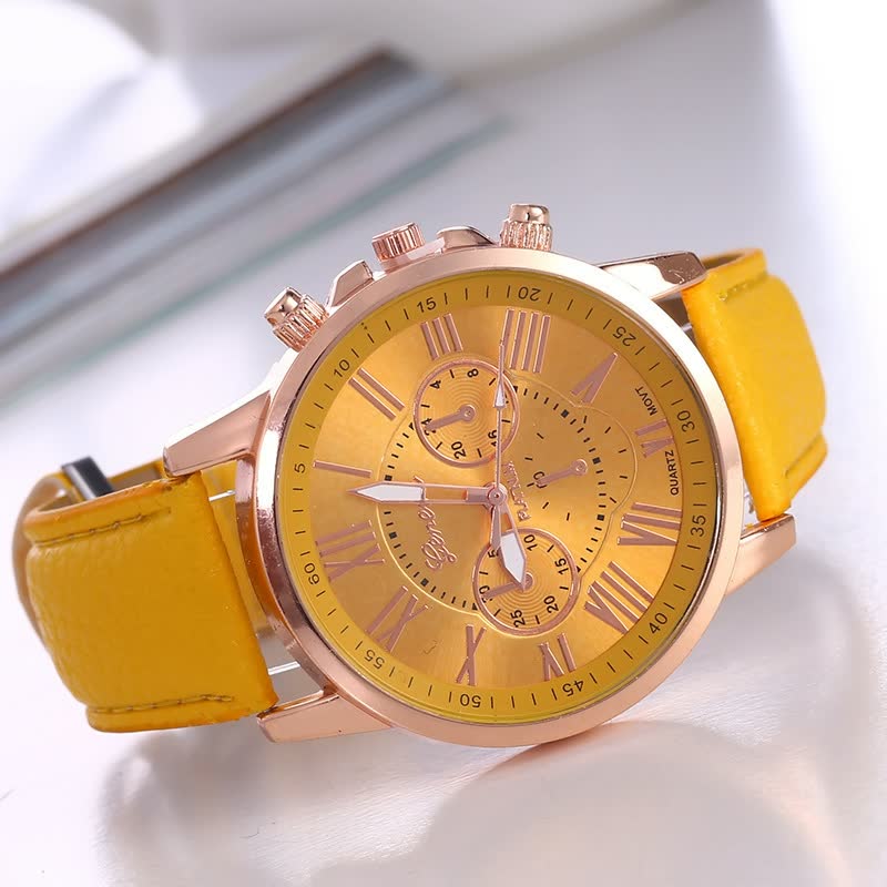 Gelbe Armbanduhr mit römischen Ziffern, goldfarbenes Gehäuse, Chronograph, Lederarmband.