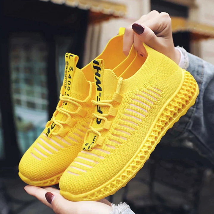 Gelbe Damen-Sneaker aus Mesh mit Plateau, atmungsaktiv, modisch, ideal für Freizeitkleidung.