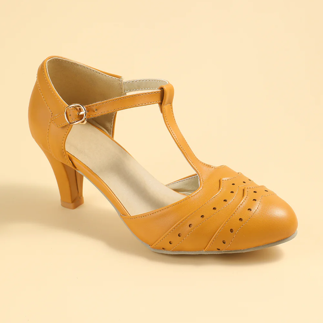 Gelber Damen-T-Riemen-Pumps aus Leder mit Absatz, elegantes Design, Vintage-Stil.