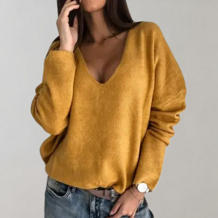 Frau in gelbem Pullover, V-Ausschnitt, lässig, modisch, Herbstmode, Damenbekleidung.