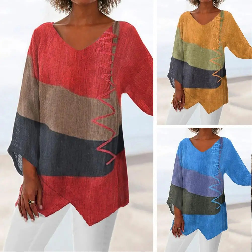 Damenbluse mit geometrischem Druck, V-Ausschnitt, lange Ärmel, rot, gelb, blau, Herbstmode.