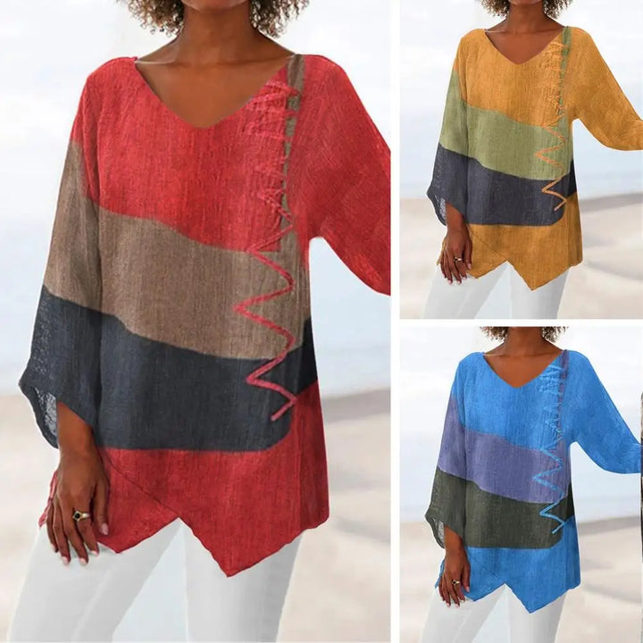 Damenbluse mit geometrischem Druck, V-Ausschnitt, lange Ärmel, rot, gelb, blau, Herbstmode.