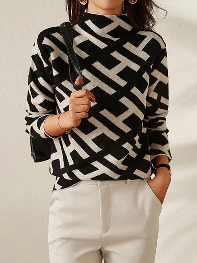 Damenpullover mit geometrischem Muster, schwarz-weiß, modisch, langärmelig, Herbstmode.