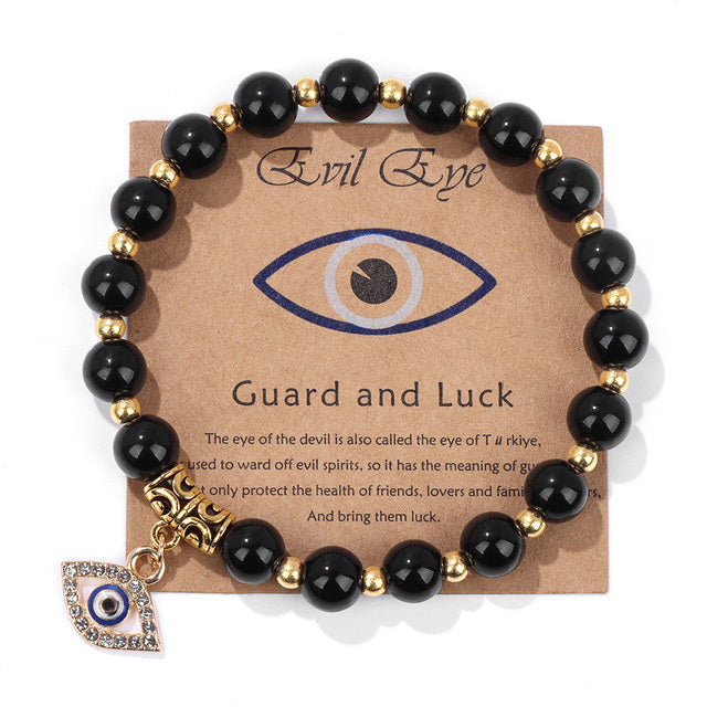 Schwarzes Perlenarmband mit türkischem Auge Anhänger, Naturstein, Glücksbringer, Geschenkidee.