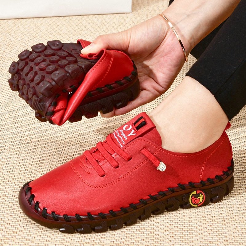 Rote bequeme Sneakers für Damen, rutschfeste Sohle, ideal für schmerzfreien Alltag.