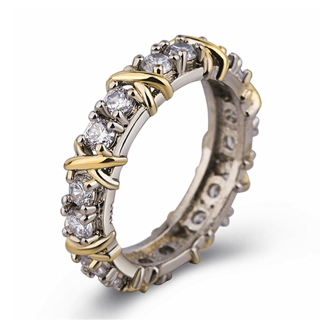 Goldener Diamantring, Ewigkeitsring, luxuriöses Schmuckdesign, funkelnde Edelsteine.