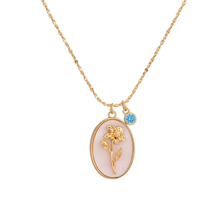 Goldene Halskette mit ovalem Anhänger, Blumenmotiv, blauer Kristall, Damen-Schmuck.