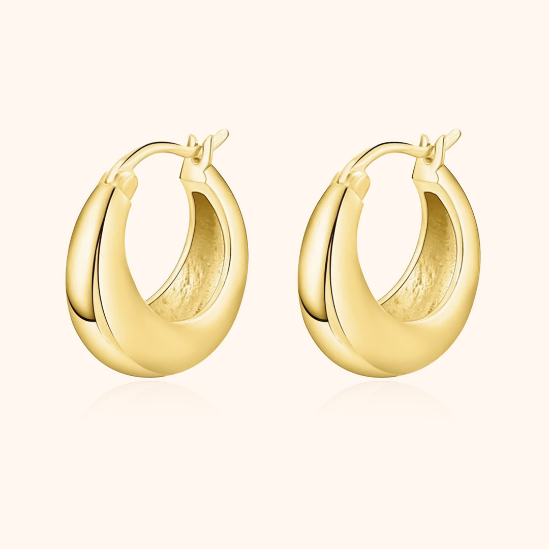 Goldene Creolen Ohrringe, glänzend, aus 14 Karat Gold, modisches Schmuckstück für Damen.