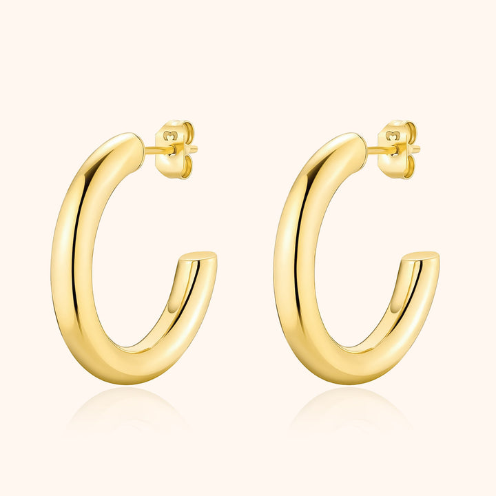 Goldene Creolen Ohrringe, glänzend, modisch, Schmuck für Damen, elegantes Design.