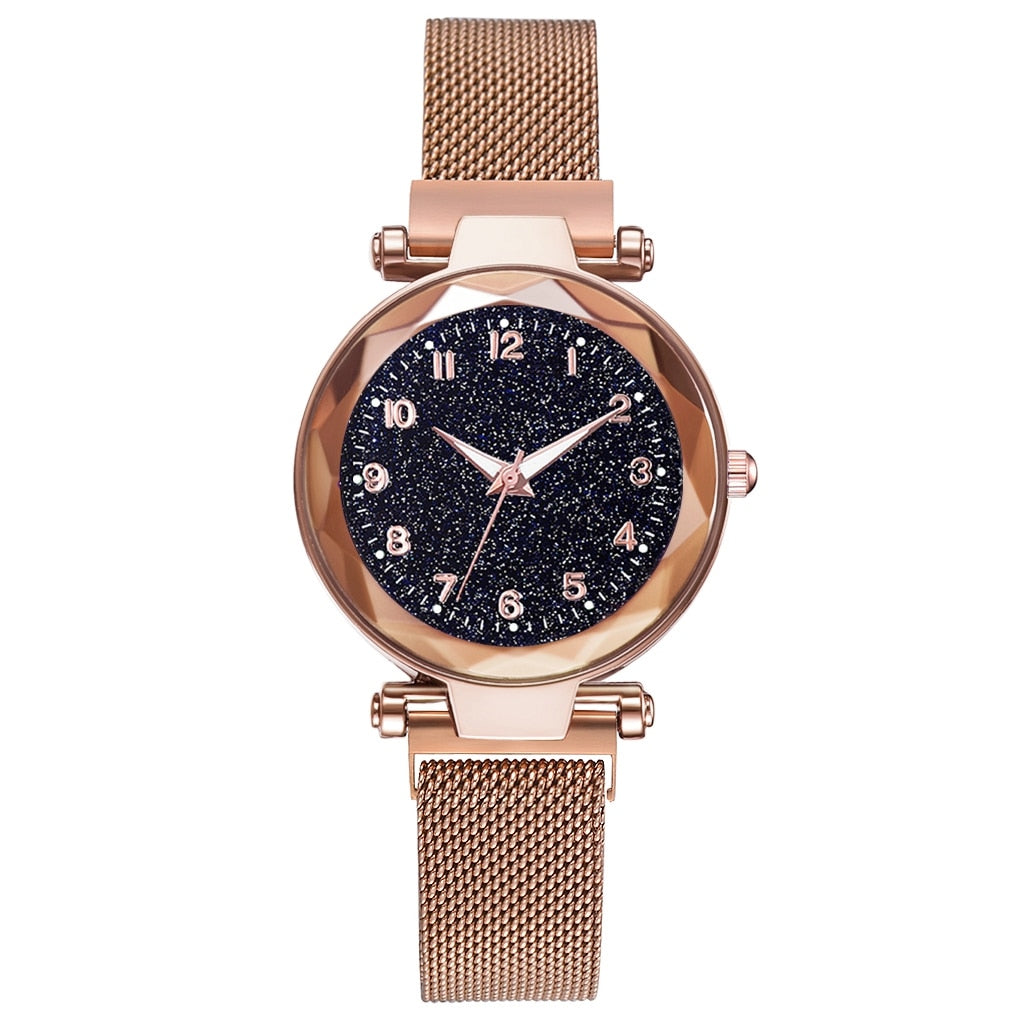 Roségoldene Damenarmbanduhr mit glitzerndem Zifferblatt und Mesh-Armband, elegant und modern.