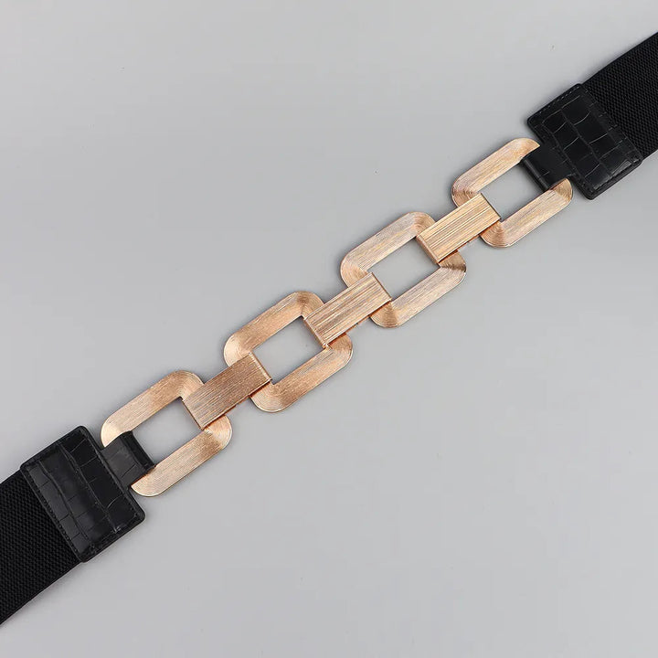 Schwarzer Gürtel mit goldener Kettenschnalle, modisches Accessoire, Damenmode.