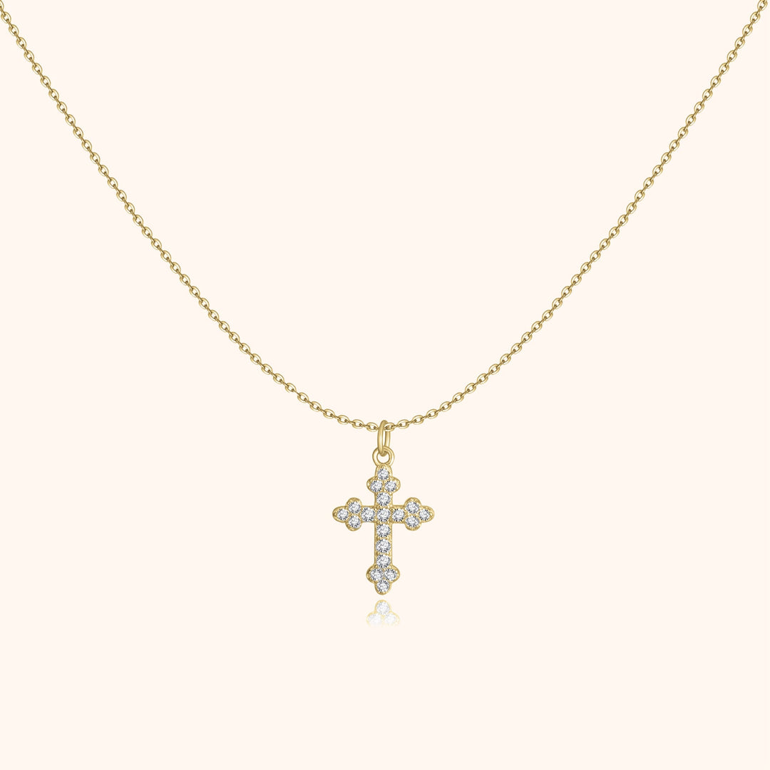 Goldene Halskette mit Kreuzanhänger, besetzt mit Diamanten, eleganter Schmuck für Damen.
