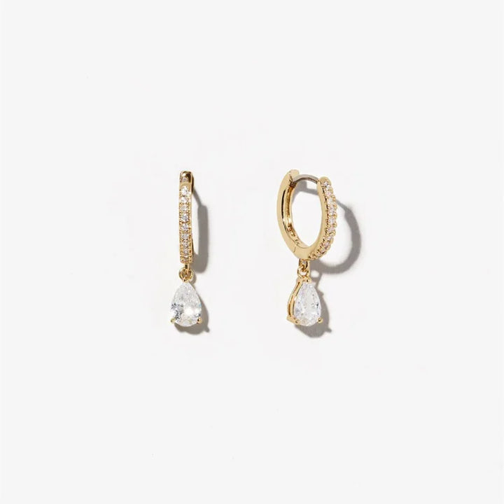 Goldene Ohrringe mit Tropfenanhänger, Zirkonia, elegant, Schmuck für Damen, modisch.