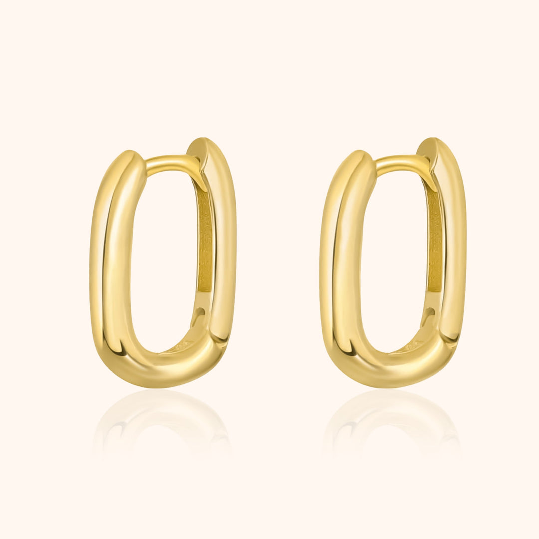 Goldene ovale Creolen Ohrringe, glänzend, modisch, Schmuck für Damen.