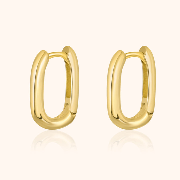 Goldene ovale Creolen Ohrringe, glänzend, modisch, Schmuck für Damen.