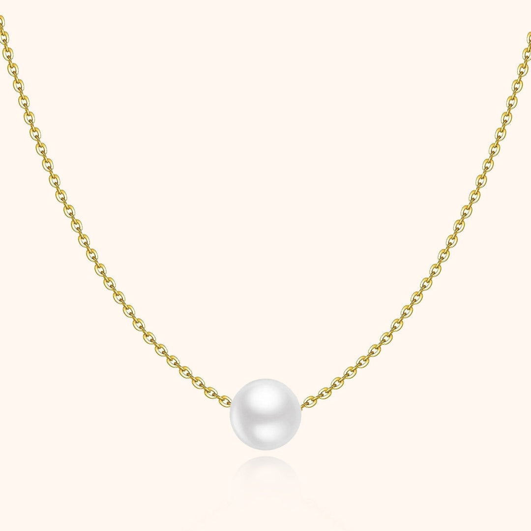 Goldene Halskette mit weißer Perle, eleganter Schmuck, Damenaccessoire, Geschenkidee.
