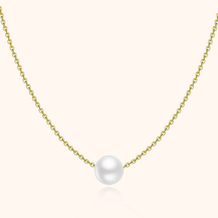 Goldene Halskette mit weißer Perle, eleganter Schmuck, Damenaccessoire, Geschenkidee.
