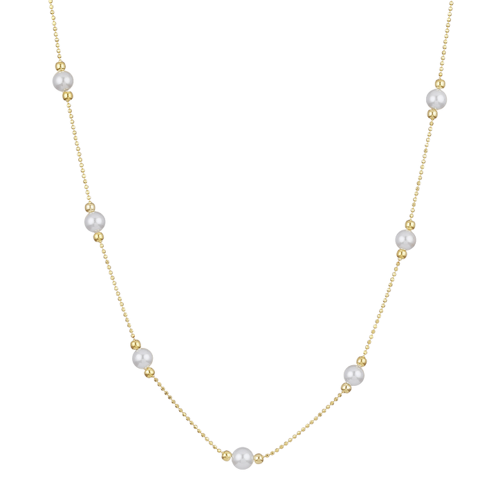 Goldene Halskette mit Perlen, elegantes Schmuckstück, Damenmode, luxuriöses Accessoire.
