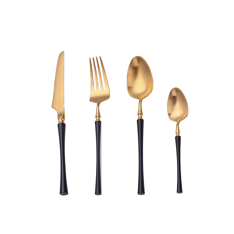 Goldenes Besteckset mit schwarzem Griff, Messer, Gabel, Löffel, Teelöffel, Edelstahl, modern.