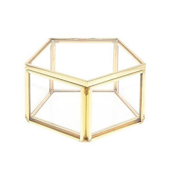 Goldene sechseckige Glasbox, Schmuckaufbewahrung, transparent, dekorativ, modern, stilvoll.