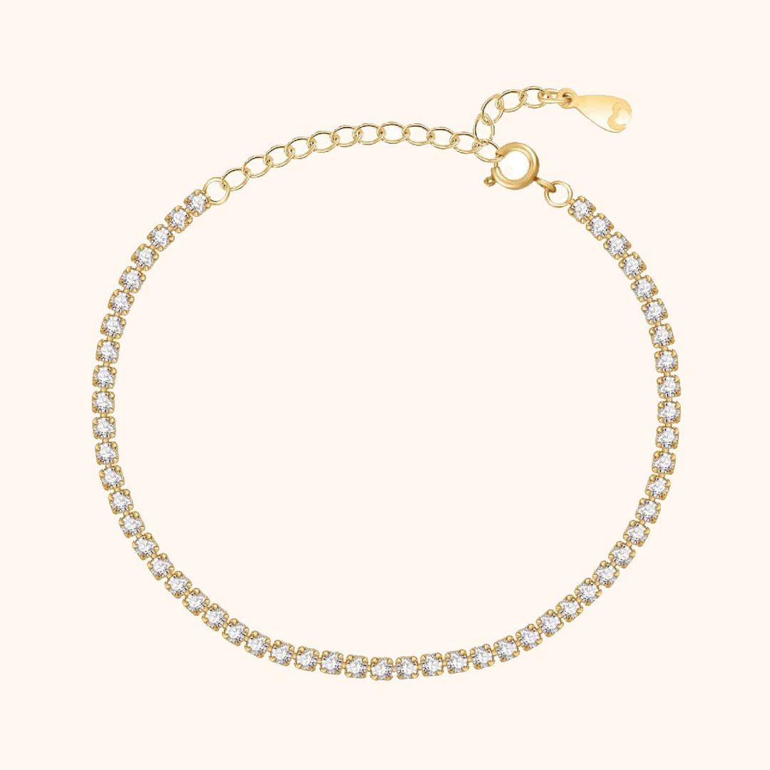 Goldenes Tennisarmband mit Zirkonia-Steinen, verstellbar, elegantes Schmuckstück für Damen.