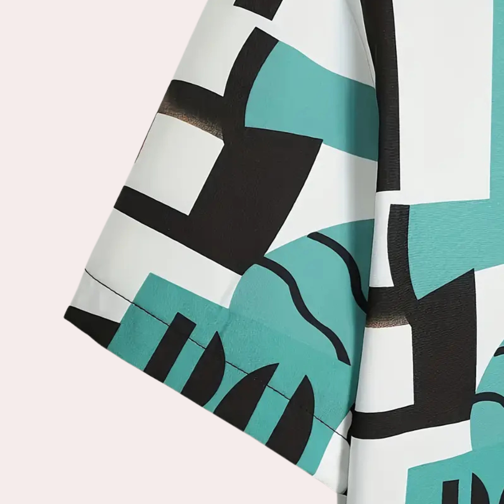 Abstraktes geometrisches Muster auf Stoff, türkis-schwarz-weiß, moderne Textildesigns.