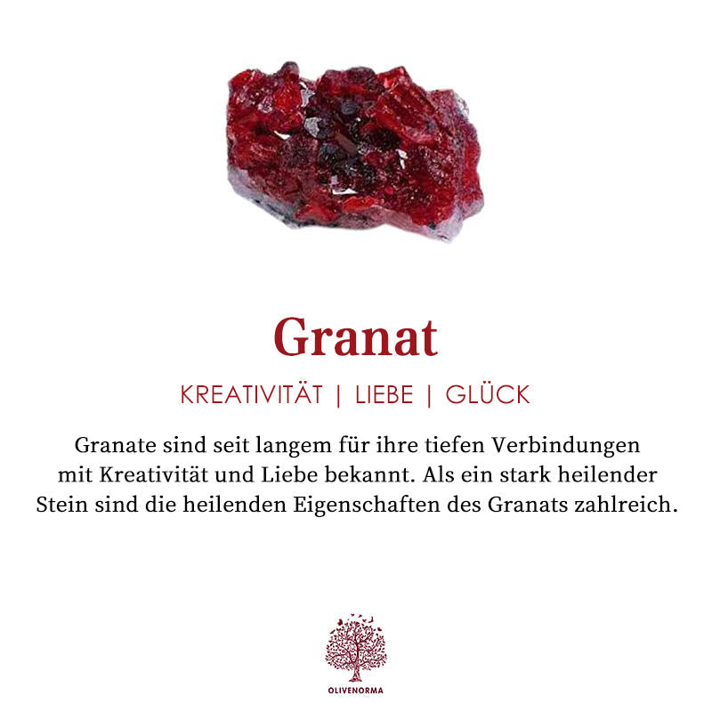 Roter Granatstein auf weißem Hintergrund, bekannt für Kreativität, Liebe und Glück.