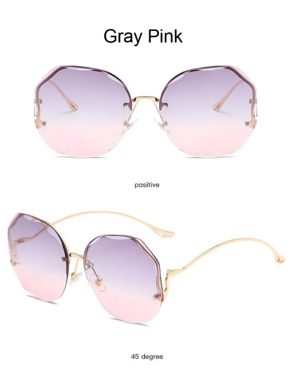 Graue und rosa Sonnenbrille, achteckig, goldene Bügel, modisches Accessoire.