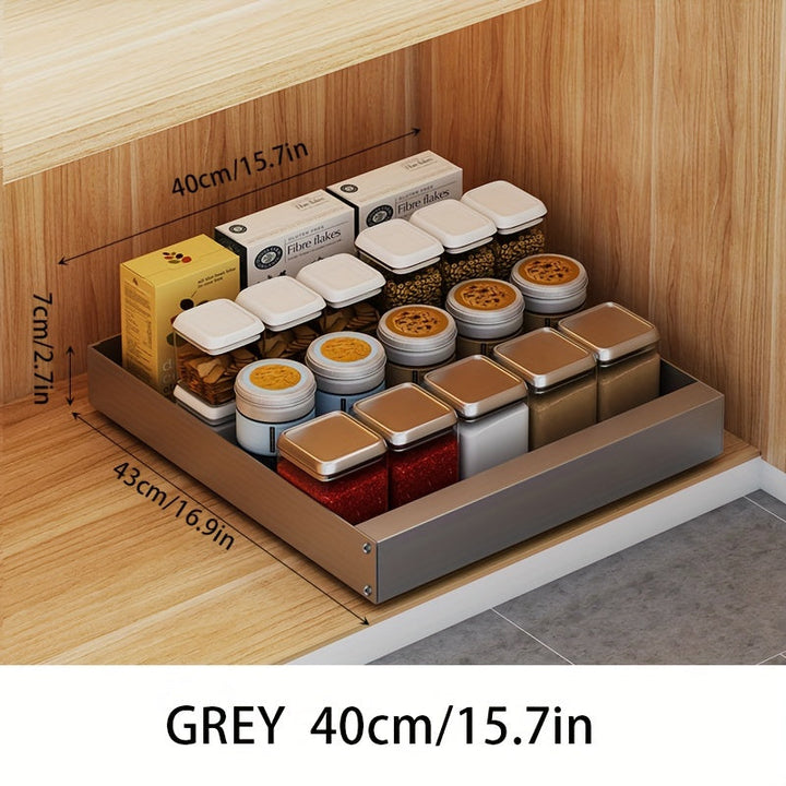 Graue Schublade 40cm, gefüllt mit Gewürzgläsern, ideal für Küchenorganisation.