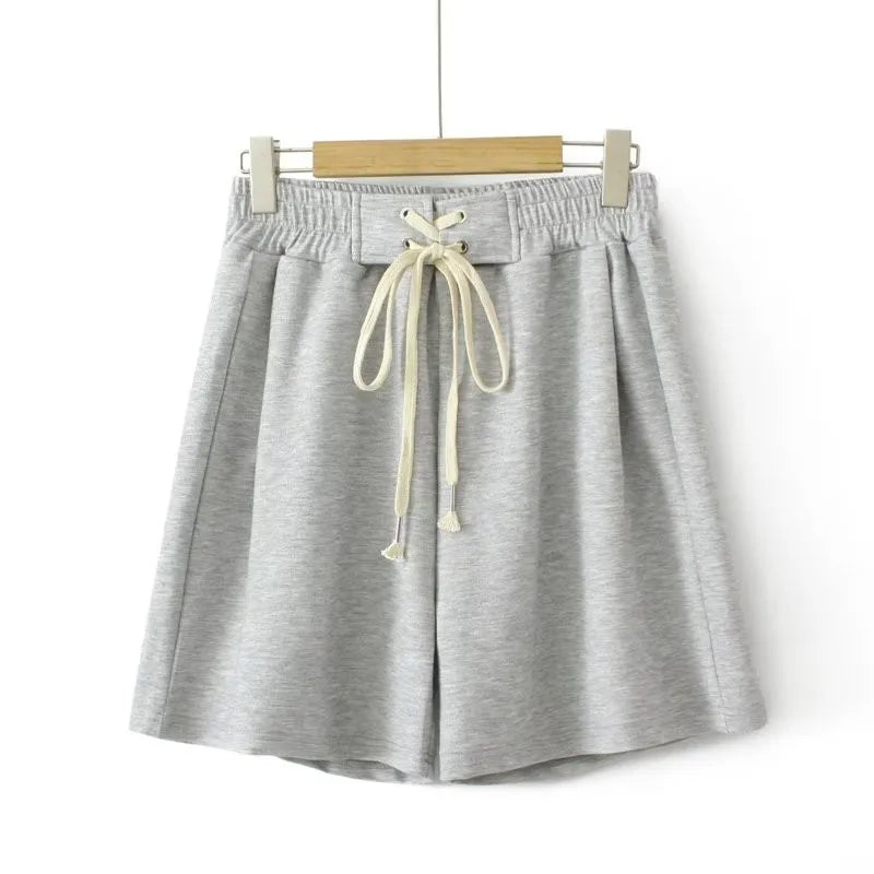 Graue Damen-Shorts aus Baumwolle mit Kordelzug, bequem und lässig für den Sommer.