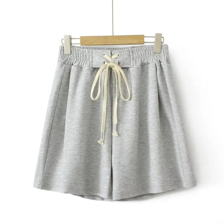 Graue Damen-Shorts aus Baumwolle mit Kordelzug, bequem und lässig für den Sommer.