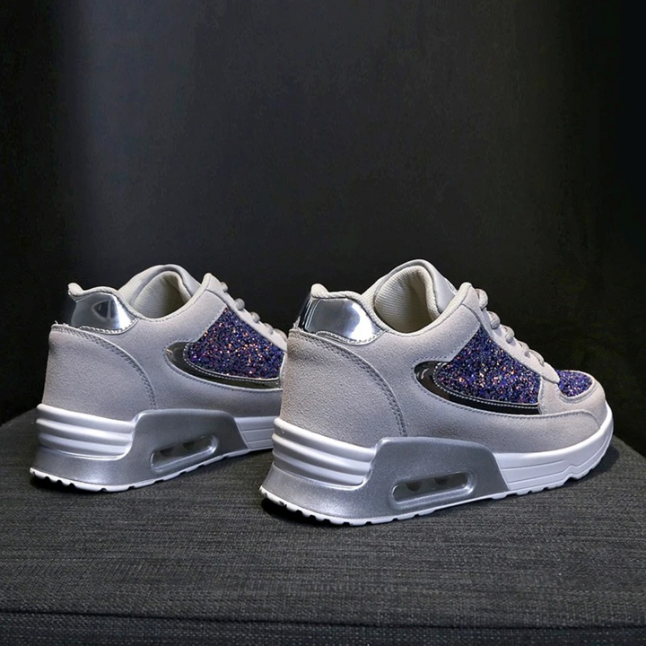 Graue Damen-Sneaker, orthopädisch, leicht, mit runder Spitze und Glitzerakzenten.
